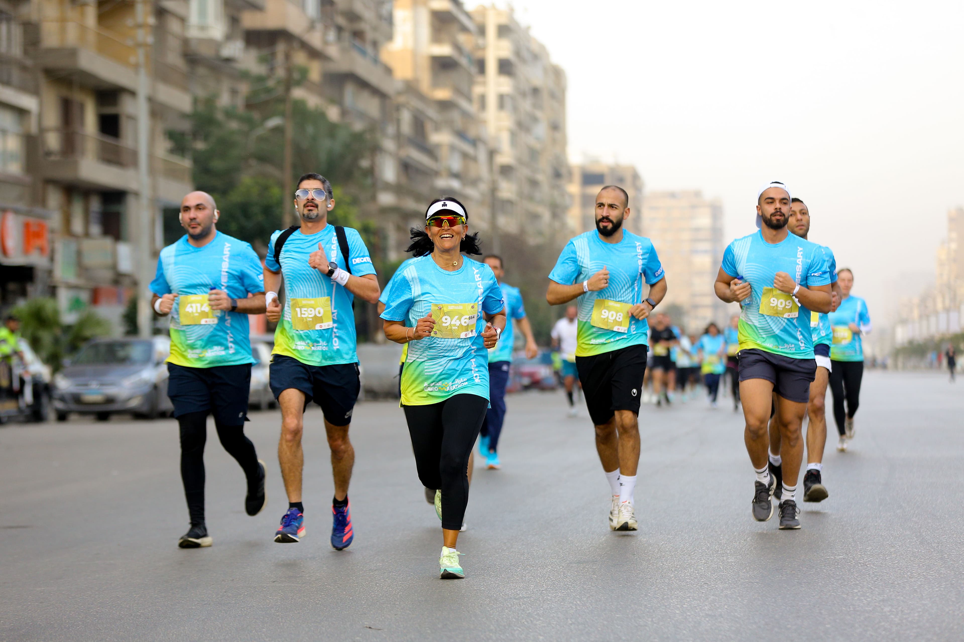 Marathon runners at sunrise